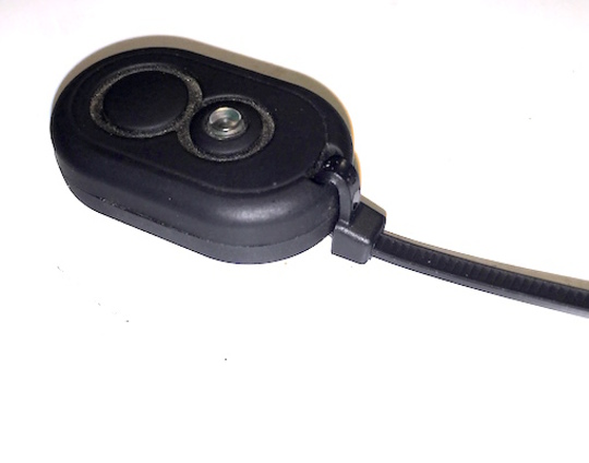 The tag, with the first zip tie attached